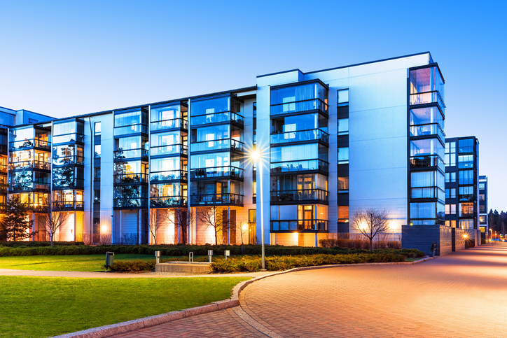 building with lights on at dusk